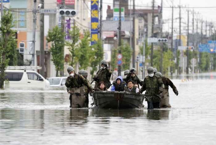 Japan warns of more heavy rain in flood-hit areas