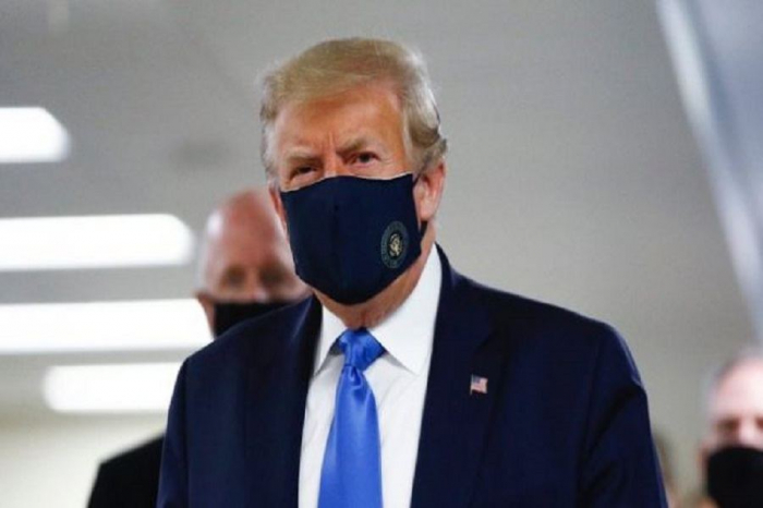 Trump wears mask, voices hope on coronavirus vaccine in North Carolina