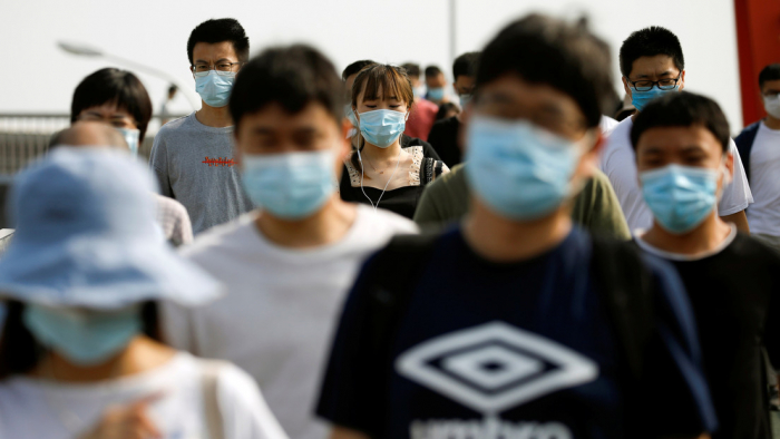 Contagios por coronavirus siguen en ascenso en China por quinto día consecutivo