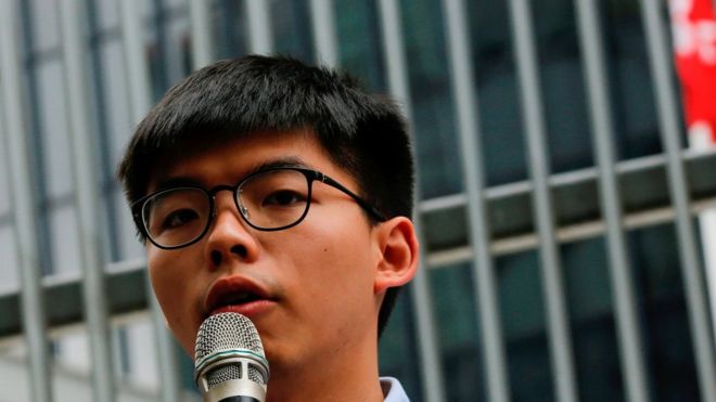 Hong Kong disqualifies 12 pro-democracy candidates from elections