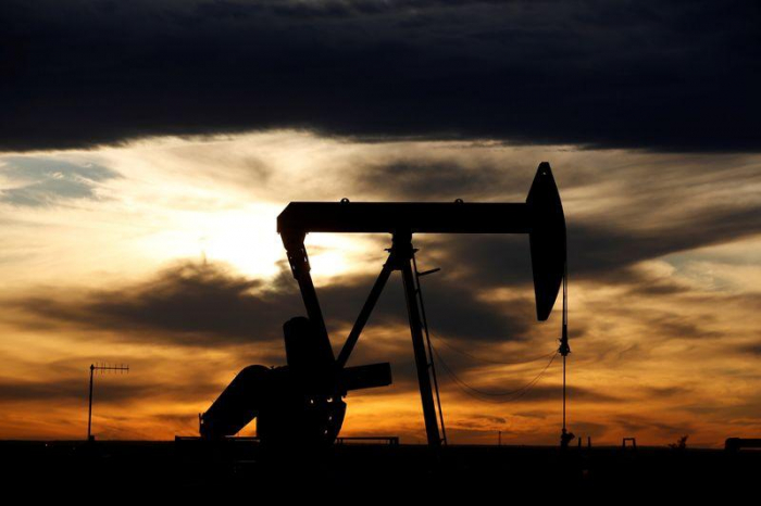 Oil prices drop on world markets as demand risk rises