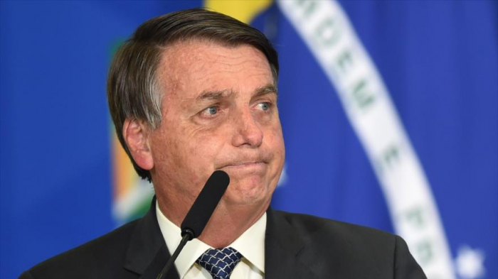 Bolsonaro reduce a mitad ayuda por COVID-19 por ser “mucho dinero”