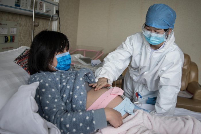Pregnant women in hospital with coronavirus less likely to show symptoms