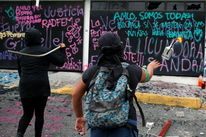 Mexican activists protesting violence against women set building on fire