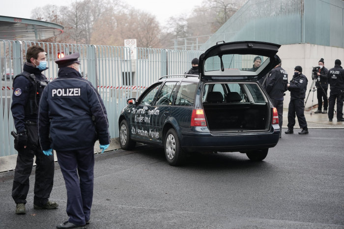 Germany: Car crashes into gate of Merkel