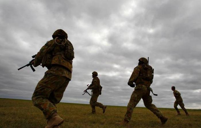 Australia issues termination notices to at least 10 soldiers over Afghan killings: ABC