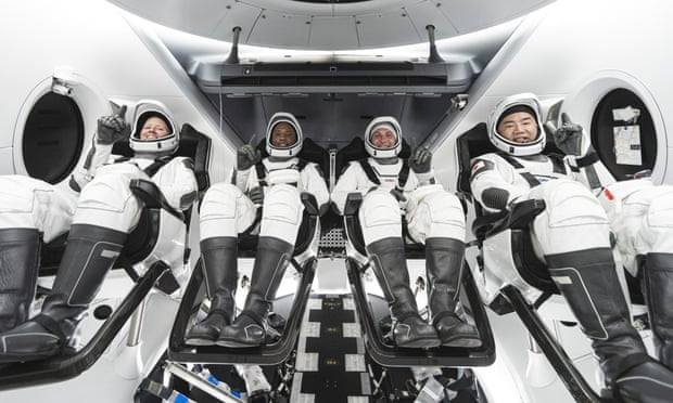     SpaceX Nasa launch:   astronauts head to International Space Station onboard Dragon capsule -   VIDEO    