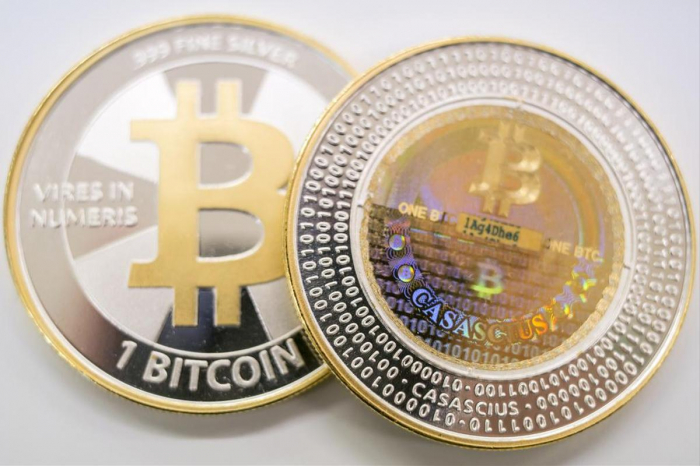 Le bitcoin dépasse son sommet historique et approche des 20.000 dollars