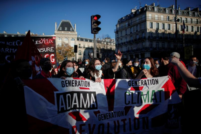 Police fire tear gas at Paris protest against police violence