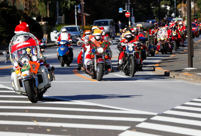 Santa Claus bikers parade in Tokyo against child abuse