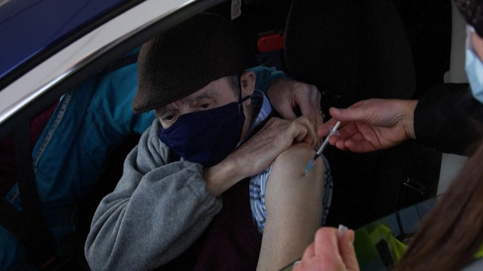   People get vaccine in drive-through COVID-19 vaccination centre -   NO COMMENT    