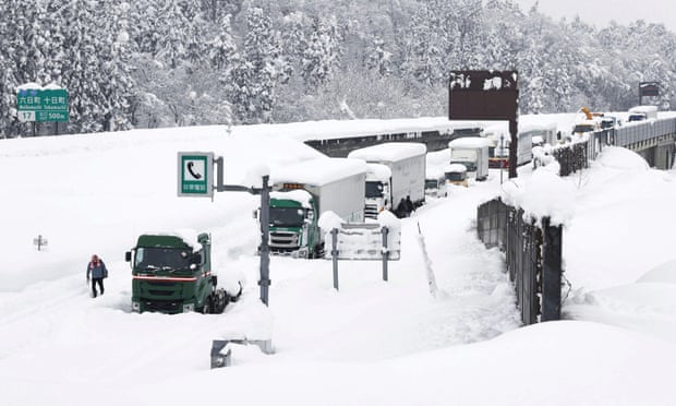 Record snowfall in Japan forces hundreds of drivers to sleep in their cars