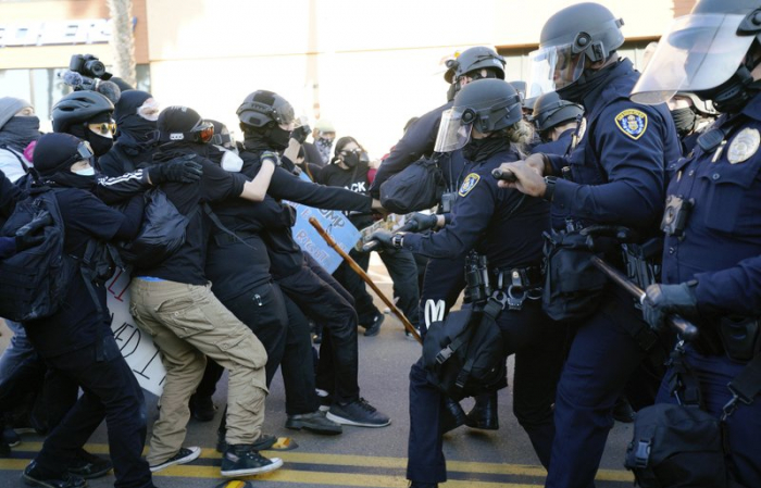 Trump supporters clash with counter-protesters in San Diego