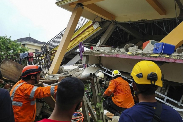 Indonesia quake toll hits 56 as rescuers race to find survivors