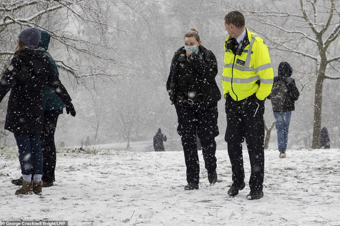   British people enjoy snow during COVID lockdown -   NO COMMENT    