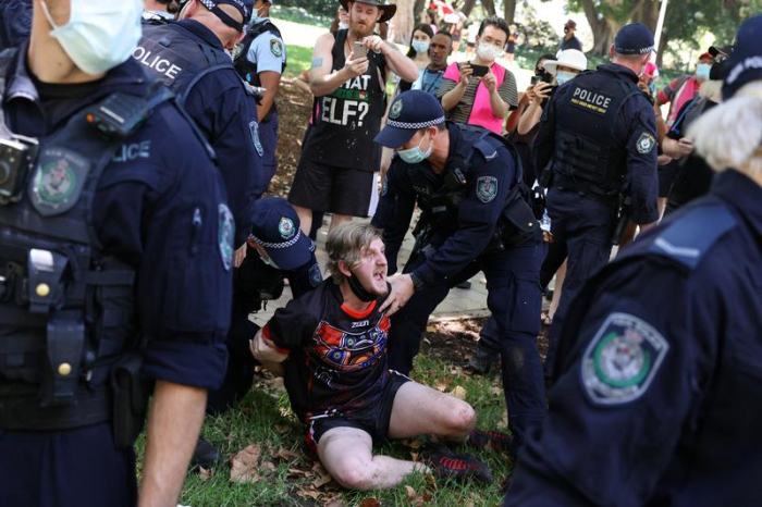 Police arrest five as Australia Day protests draw thousands