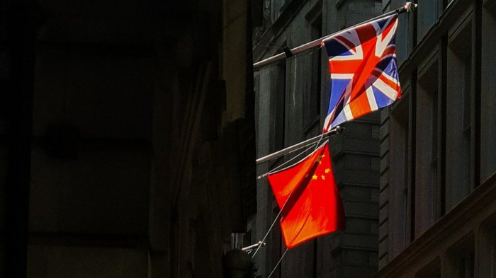 Chinese journalists expelled from UK over spying
 