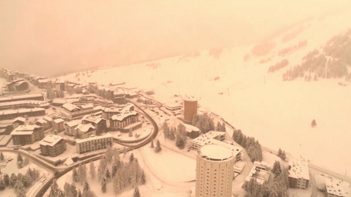  Red dust from Sahara turns Italian alpine villages orange -  NO COMMENT  