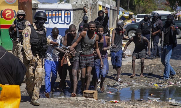 Prison director and gang leader among 25 killed in Haitian jailbreak