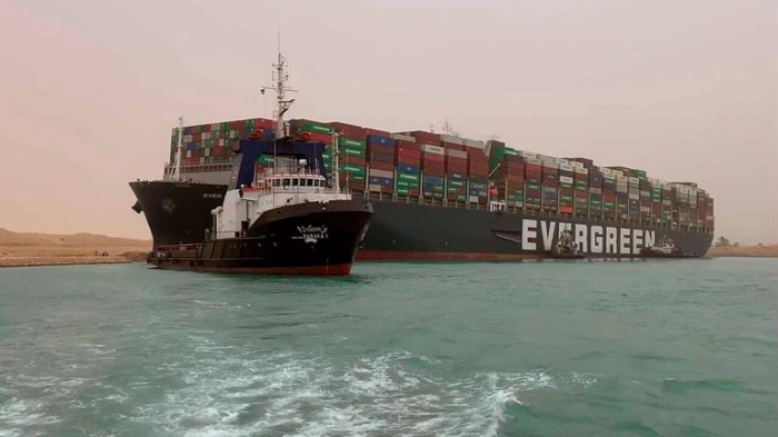 321 vessels jammed around Suez Canal as salvage of stuck container ship underway