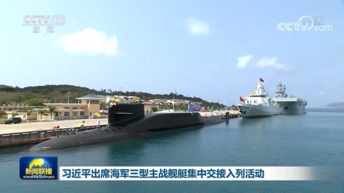 China puso en servicio dos buques de guerra y un submarino nuclear para reforzar su flota de las zonas disputadas del Mar del Sur