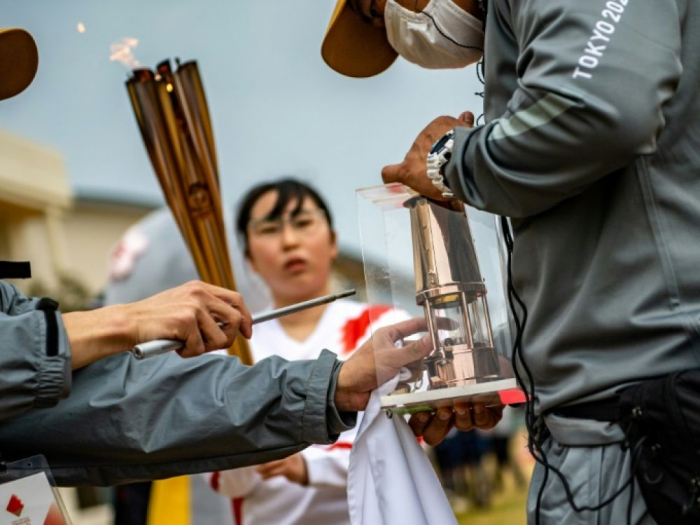 JO de Tokyo: le relais de la flamme olympique à huis clos à Okinawa