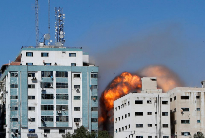 Gaza tower housing AP, Al Jazeera collapses after missile strike - witness