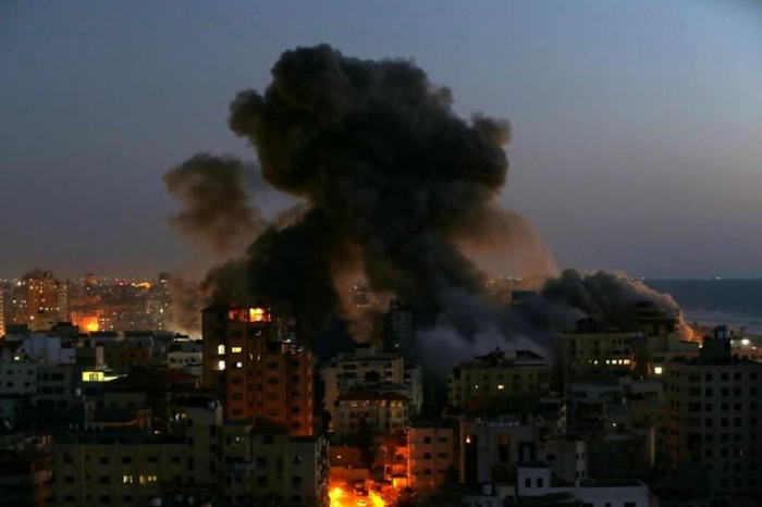 Gaza block collapses after Israeli strike, rocket hits Tel Aviv building