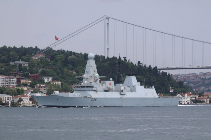 Russia says it chases British destroyer out of Crimea waters with warning shots, bombs
