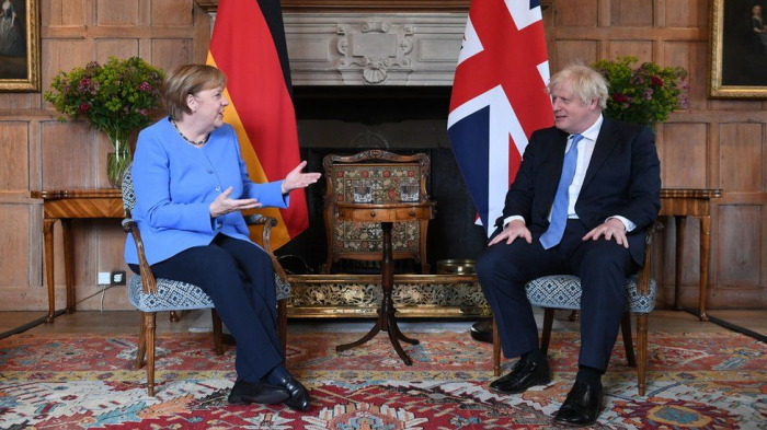 UK PM Johnson discusses travel curbs with Germany’s Merkel