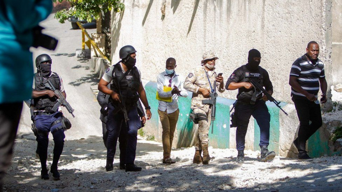 Police kill four after Haiti