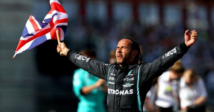 Hamilton overcomes crash and time penalty to claim British GP