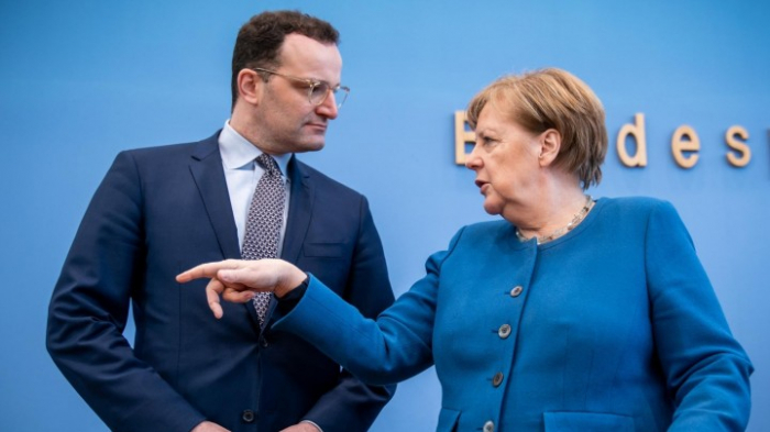 Merkel und Spahn werben für hohe Impfquoten