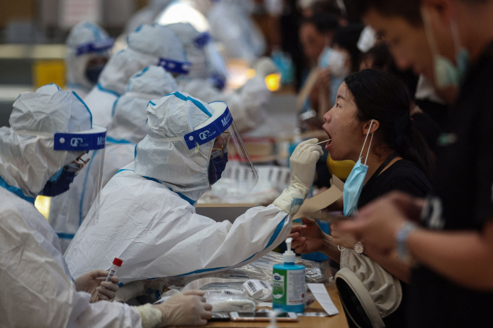 Chinese cities test millions amid increase of COVID-19 cases