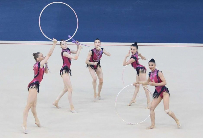   Azerbaijani team presents exercise with three hoops and two pairs of clubs as part of Tokyo 2020  