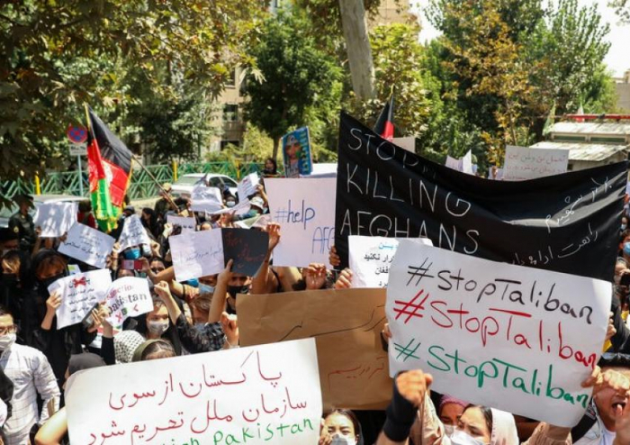 Iran gets ready for refugee influx as Afghans protest