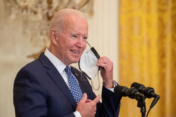 Biden planea convocar una cumbre global para contener la pandemia