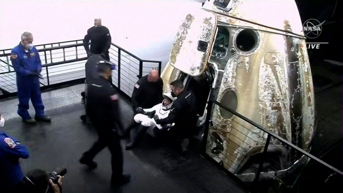   SpaceX Crew returns to earth, exits capsule after successful splashdown -   NO COMMENT    