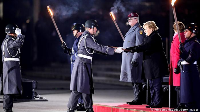  German military honors outgoing Chancellor Angela Merkel with punk rock sendoff 