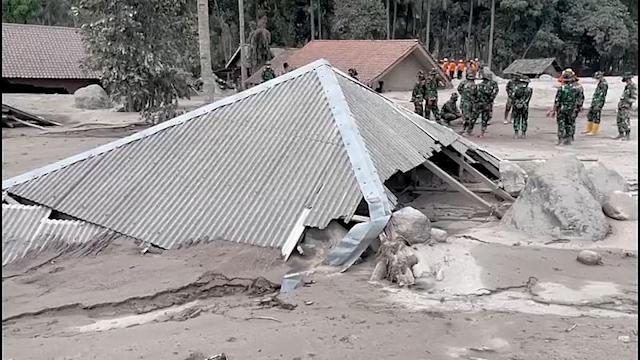   Indonesia Volcano Damage - Houses buried as Mount Semeru death toll rises to 13 -   NO COMMENT    