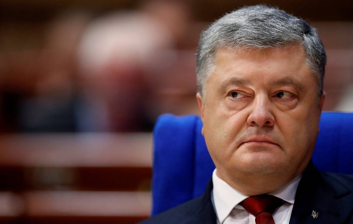    Poroşenko dövlətə xəyanətdə ittiham olunur   