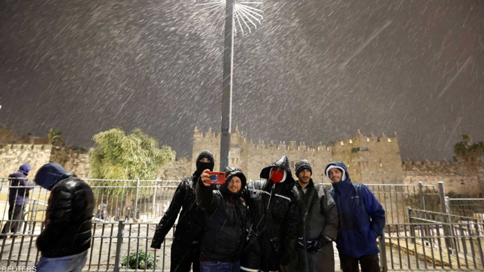 الثلوج تكسو الأردن وفلسطين -   صور   