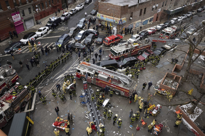 New York apartment fire kills 19, including 9 children