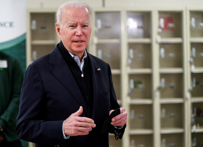 After year at White House, Biden under scrutiny over COVID-19 disaster
