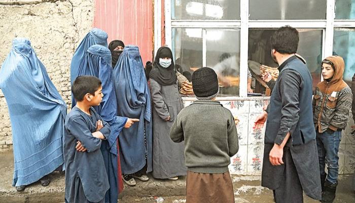   Desperate Afghans queue for free bread -   NO COMMENT    