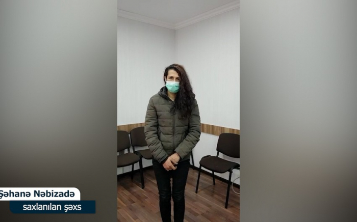 Bankomatdan pul çıxaran qadının çantasını əlindən aldı 