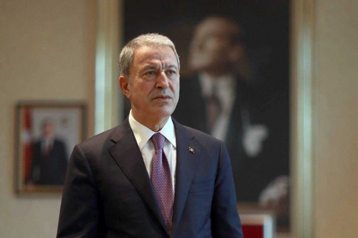 Turkish defense minister will attend NATO meeting after testing negative for COVID-19