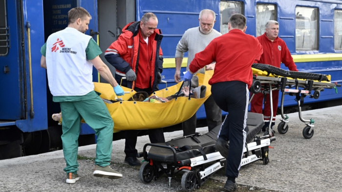   Speeding west, the Ukraine hospital train ferries patients to safety -   NO COMMENT    