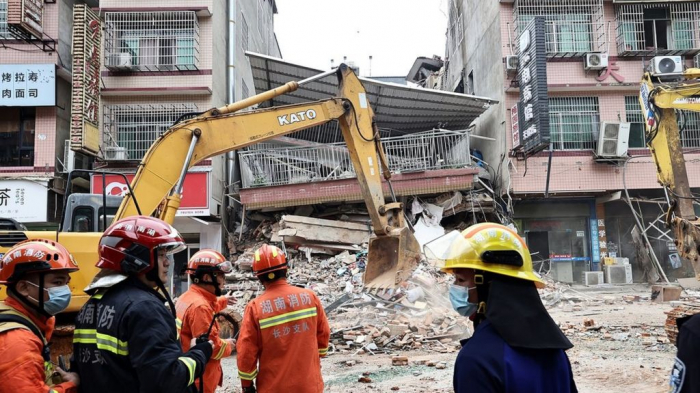 53 people dead in central China building collapse