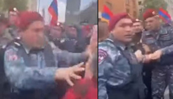    Erməni polisi yaşlı qadını döydü -    VİDEO      